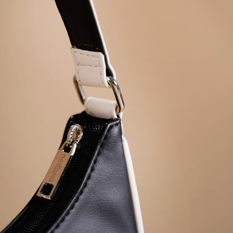 Sleek Urbanite Black Moon Handbag