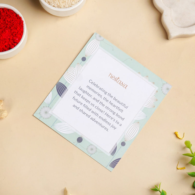 Botanic Bloom And Crystal Charm Rakhi Set of 2