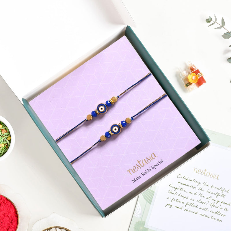 Gold Blue Protective Rakhi Gift Set Of 4 With Box And Card