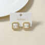 Gold Framed Pearl Studs