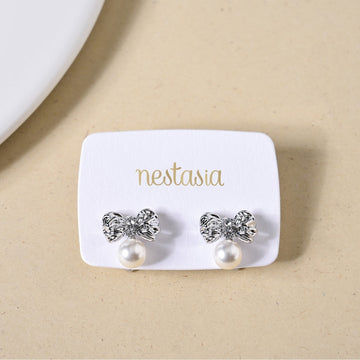 Hammered And Dainty Silver Bow Studs