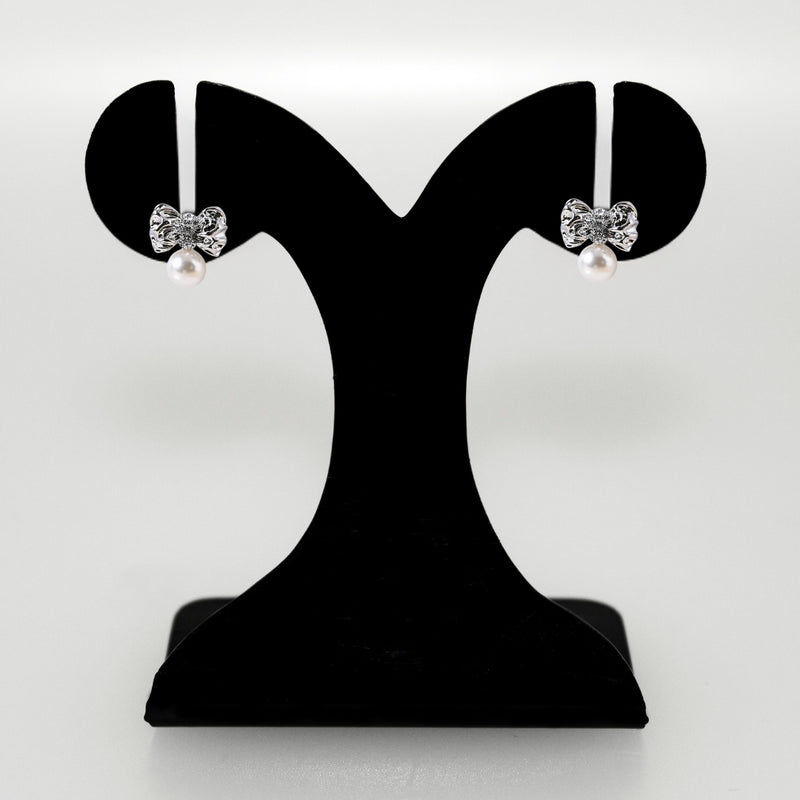 Hammered And Dainty Silver Bow Studs