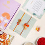 Orange And Gold Peacock Rakhi Gift Set