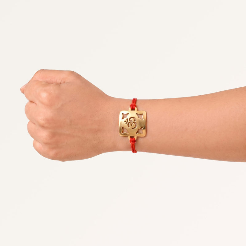 Om Square Brass Rakhi With Golden Finish Gift Set