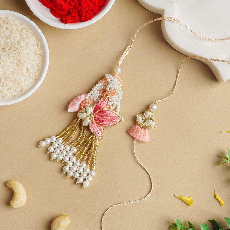 Pink Beads Rakhi And Lumba Set For Couples