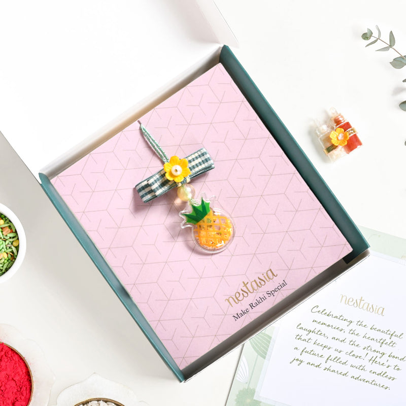 Puffy Pineapple Girl Rakhi Hamper Set Of 3 With Box And Card