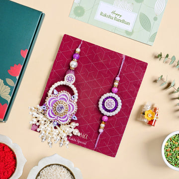 Purple Pearl Beaded Rakhi With Floral Lumba For Couples