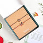 Radha Krishna And Ganesh Krishna Rakhi Gift Set