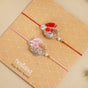 Rose and Pearl Set Of 2 Rakhi Gift Set