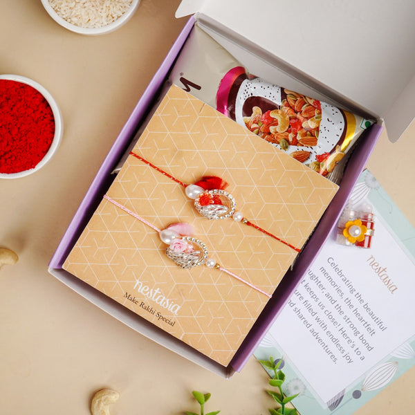 Rose and Pearl Set Of 2 Rakhi Gift Set