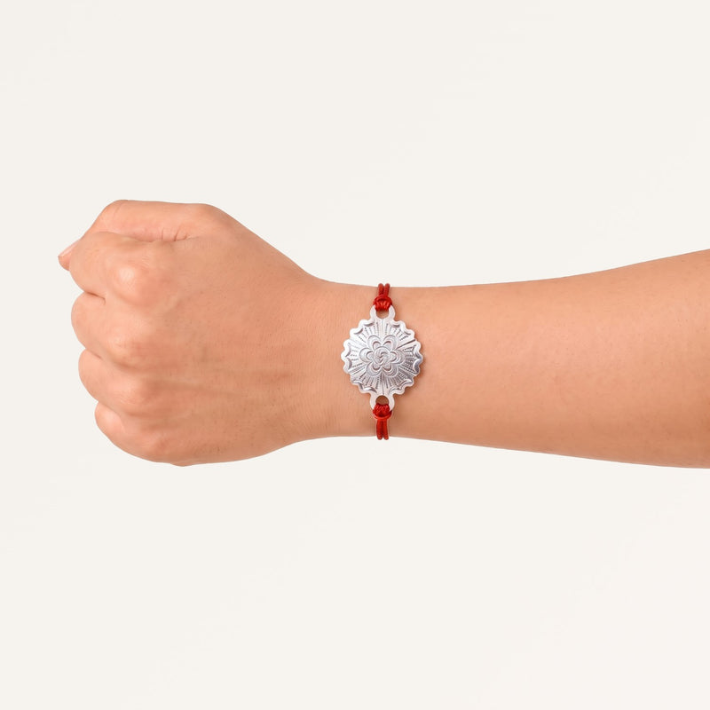 Sacred Brass Rakhi With Silver Finish Gift Set