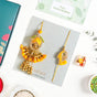 Set Of 4 Couple Yellow Rakhi And Lumba Gift Box