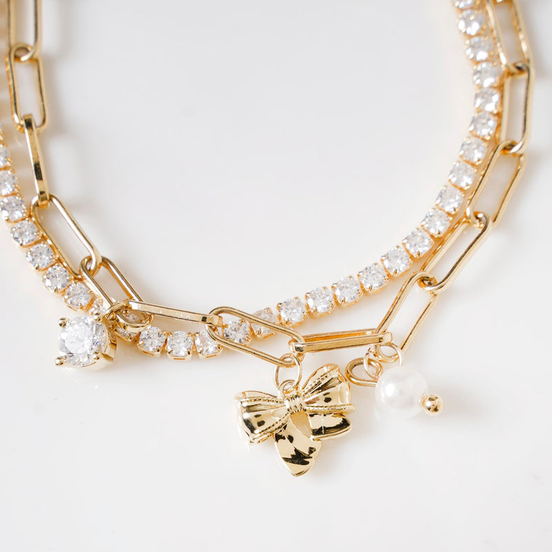 Stone Studded Gold Bow Charm Bracelet