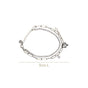 Stone Studded Silver Bow Charm Bracelet