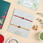 Scarlet Bloom Mauli Rakhi Set