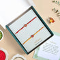 Scarlet Bloom Mauli Rakhi Set