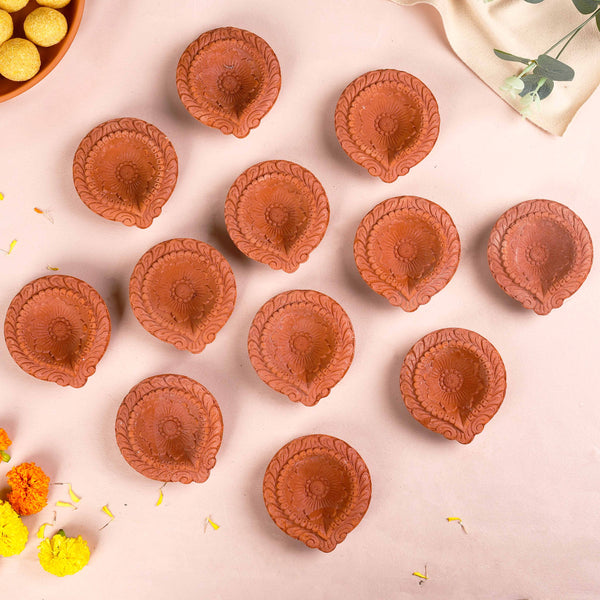 Set Of 48 Flower Motif Carved Earthen Clay Diyas