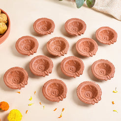 Set Of 48 Flower Engraved Earthen Clay Diyas