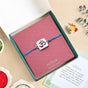 Vedic Om Silver Finish Brass Rakhi Gift Set