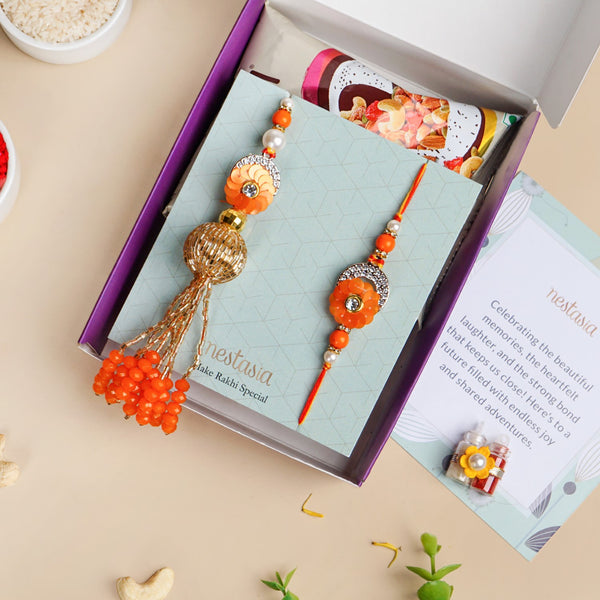 Vibrant Coloured Rakhi Lumba Set For Brother And Bhabhi