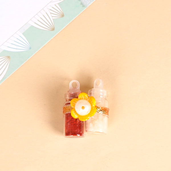 Vibrant Floral Rakhi Hamper For Bhaiya And Bhabhi