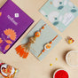 Vibrant Coloured Rakhi Lumba Set For Brother And Bhabhi