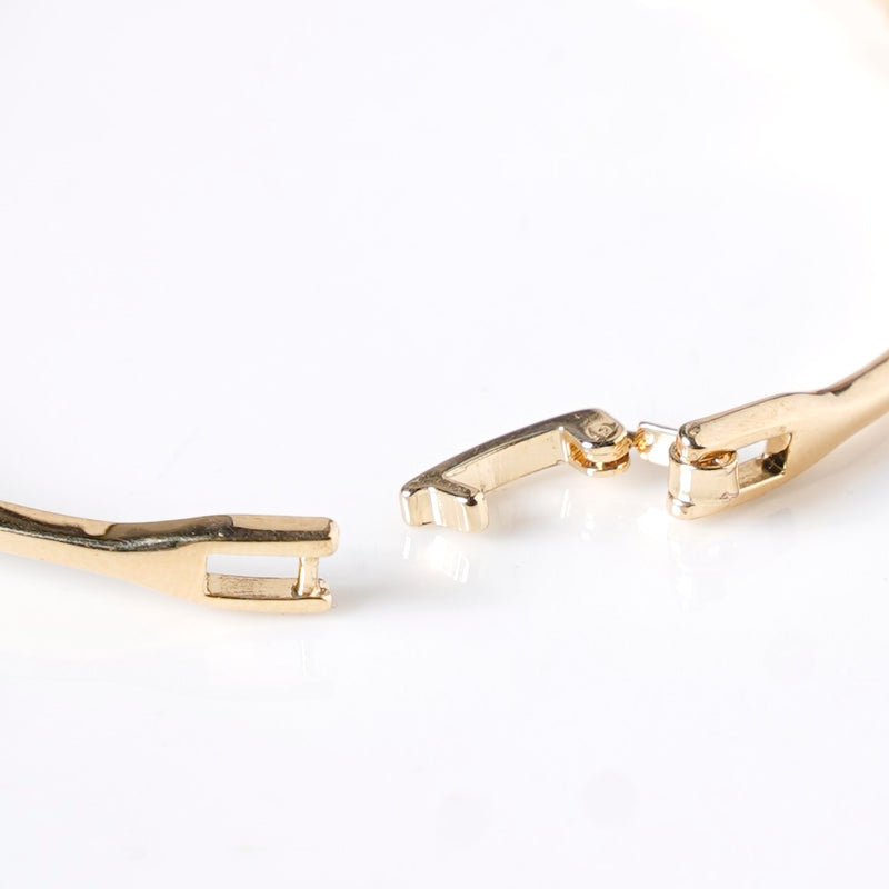 Waves And Swirls Gold Bracelet
