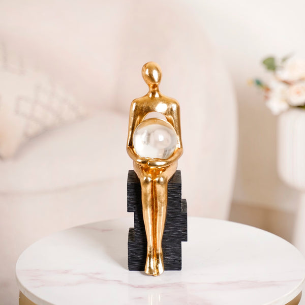 Abstract Gold Sitting Figurine With Crystal Ball