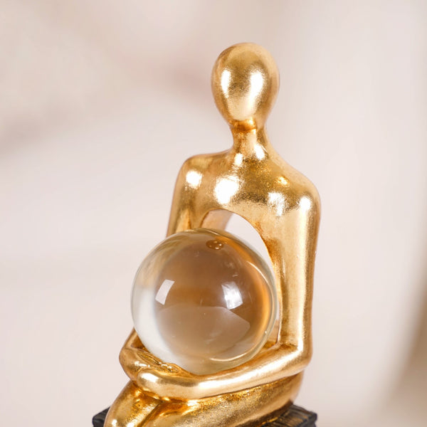 Abstract Gold Sitting Figurine With Crystal Ball