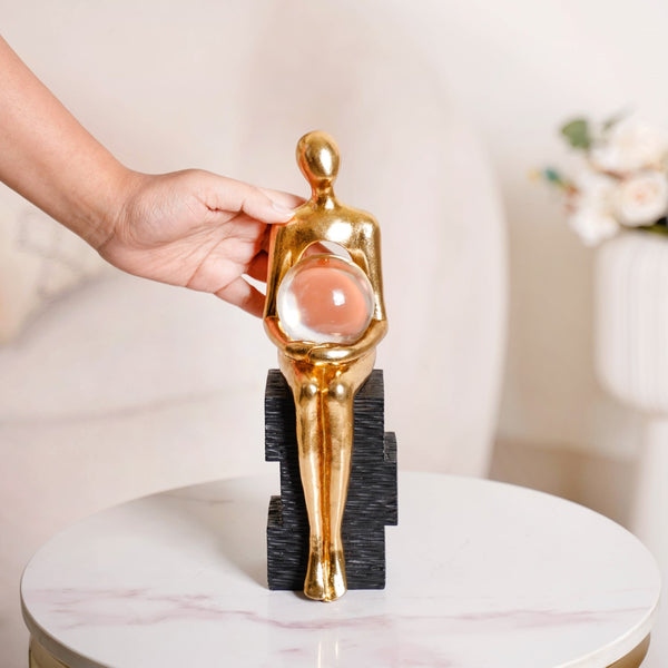 Abstract Gold Sitting Figurine With Crystal Ball