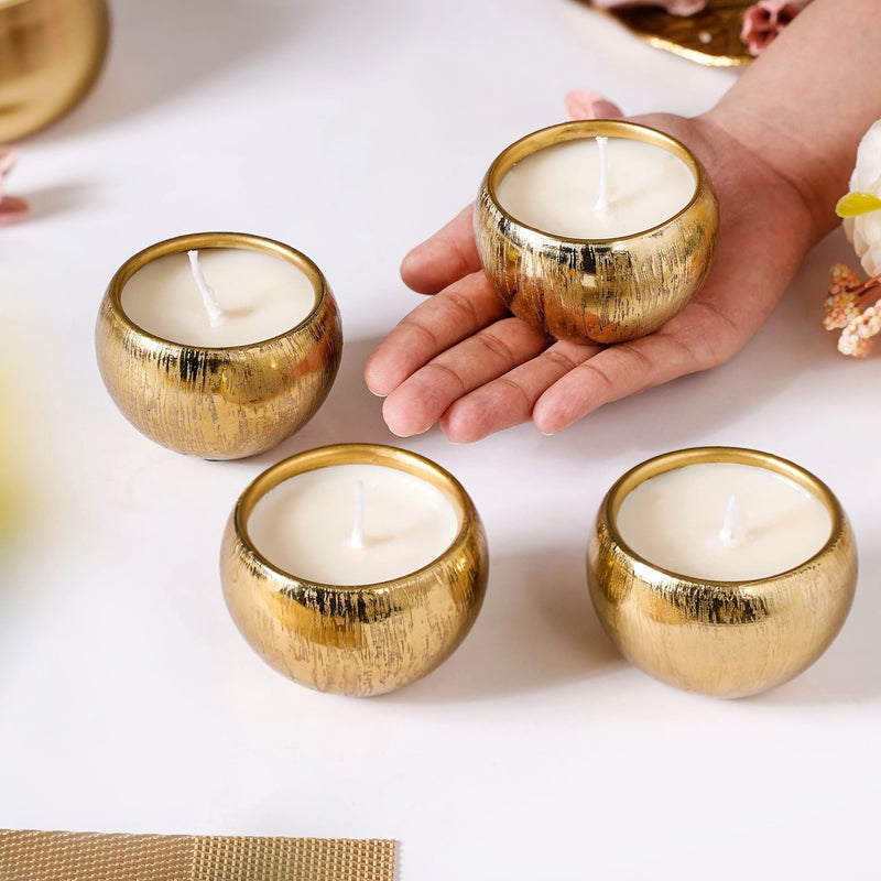 Handcrafted festive gold candles set