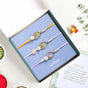 Blossom Encased Reverie Rakhi Bracelet Set
