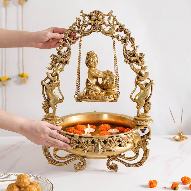 Brass Laddu Gopal Decorative Urli Bowl With Swing- Brass Laddu Gopal Urli, Decorative Urli Bowl, Swinging Laddu Gopal, Brass Home Decor