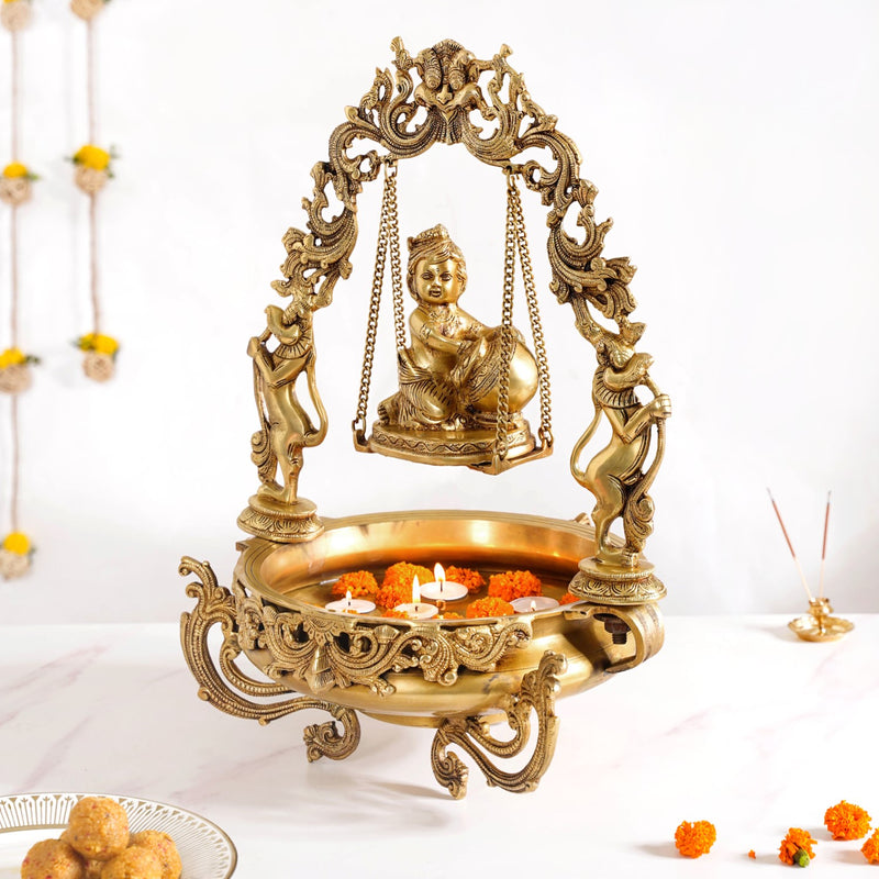 Brass Laddu Gopal Decorative Urli Bowl With Swing- Brass Laddu Gopal Urli, Decorative Urli Bowl, Swinging Laddu Gopal, Brass Home Decor