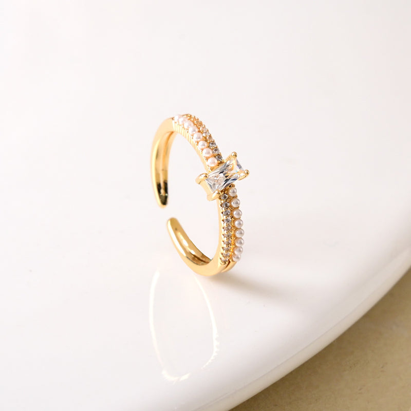 Dual Essence Gold Baguette Solitaire Ring