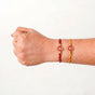 Scarlet Bloom Mauli Rakhi Set