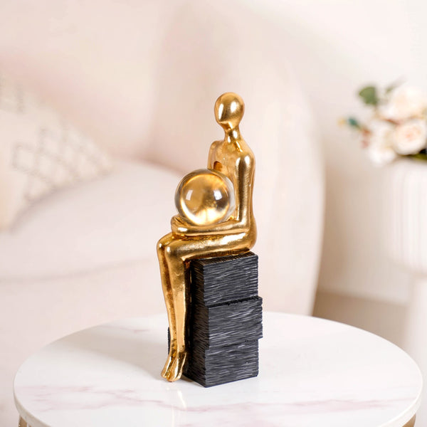 Abstract Gold Sitting Figurine With Crystal Ball