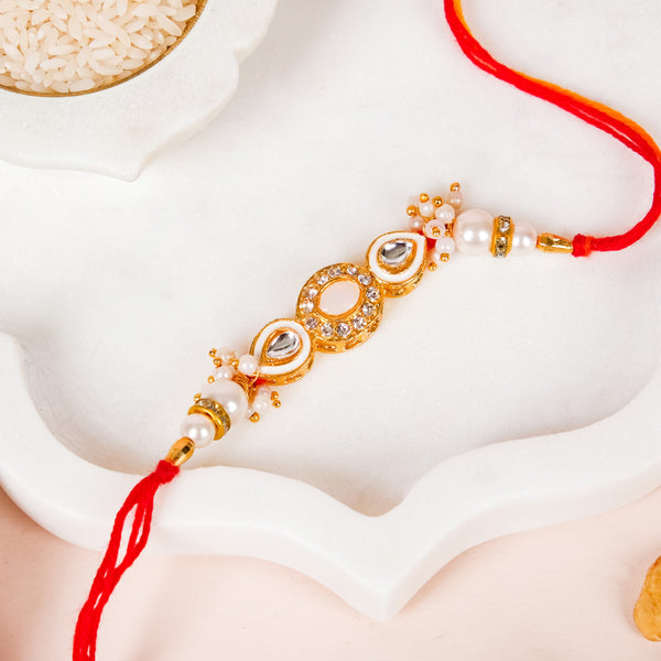 Stone And Pearl White Kundan Rakhi Set For Couple