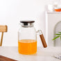Wavy Glass Pitcher With Wooden Handle And Lid