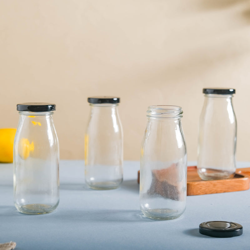 Small Glass Bottle with Lid Set of 4 - Water bottle, juice bottle, glass bottle | Bottle for Travelling & Dining Table