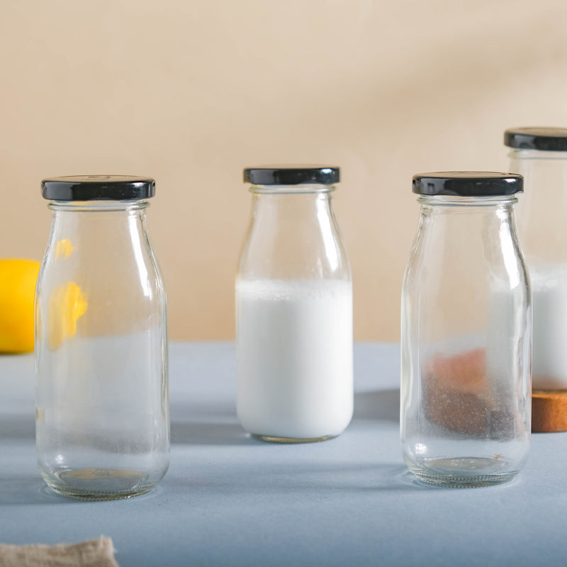 Small Glass Bottle with Lid Set of 4 - Water bottle, juice bottle, glass bottle | Bottle for Travelling & Dining Table