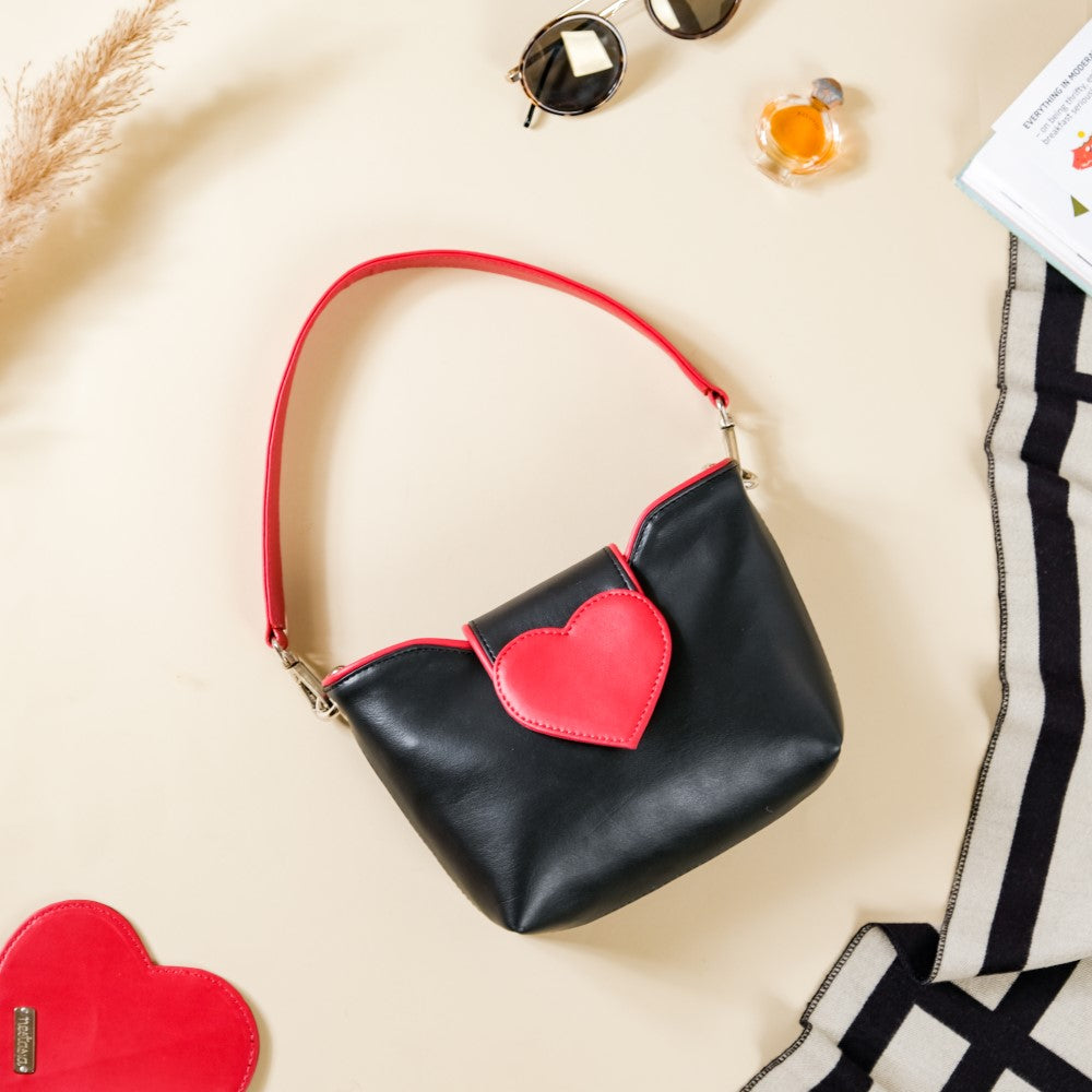 Black purse with online red inside