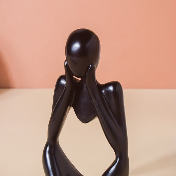 Black Sitting Showpiece