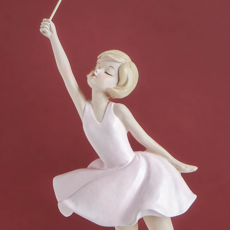 Winsome Figurine With Balloons - Showpiece | Home decor item | Room decoration item