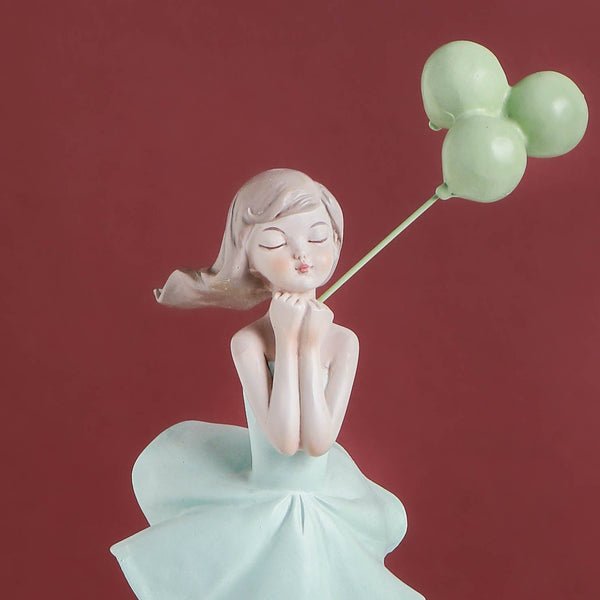 Winsome Figurine With Balloons - Showpiece | Home decor item | Room decoration item