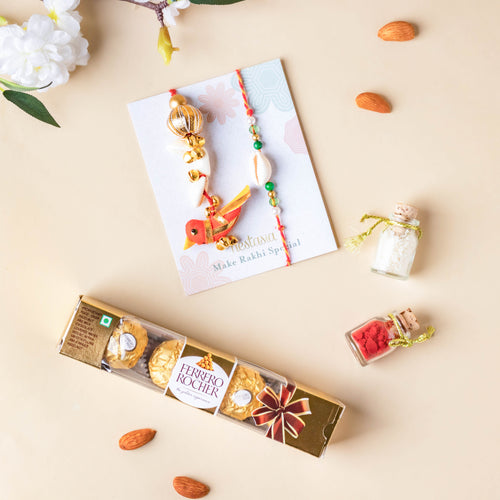 Bird And Shell Couple Rakhi Set For Bhaiya Bhabhi With Roli Chawal And Chocolates