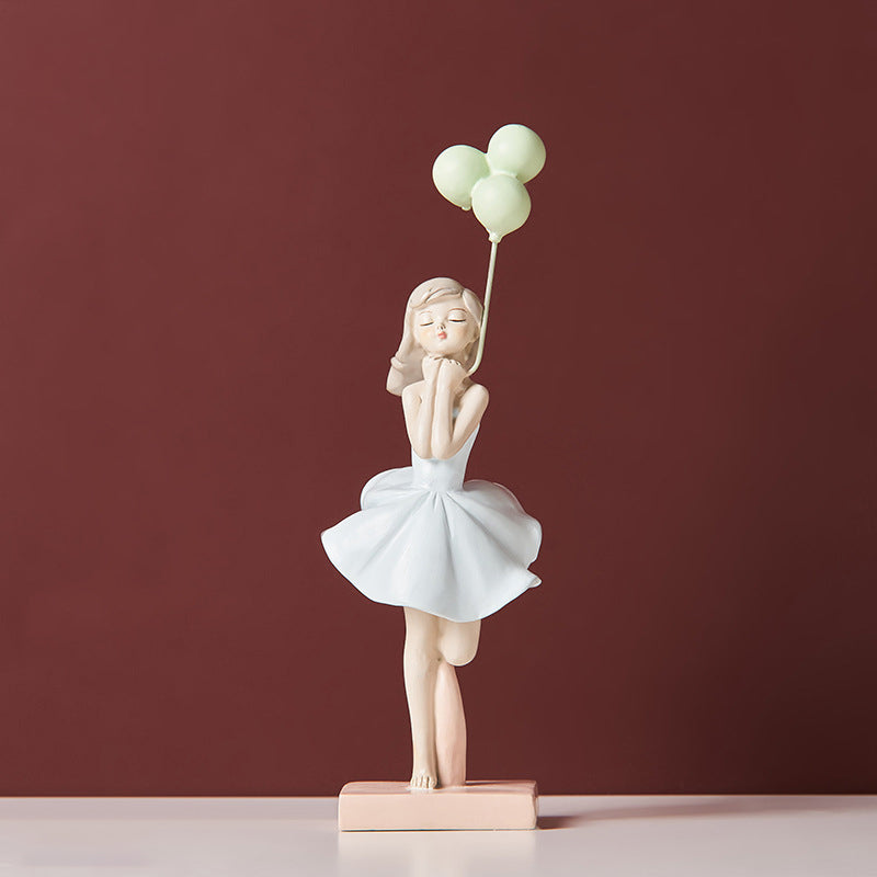 Winsome Figurine With Balloons - Showpiece | Home decor item | Room decoration item